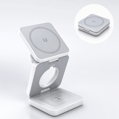 A white and gray foldable wireless charging stand with a square magnetic charging pad on top, shown open with a small inset circle displaying the product closed.